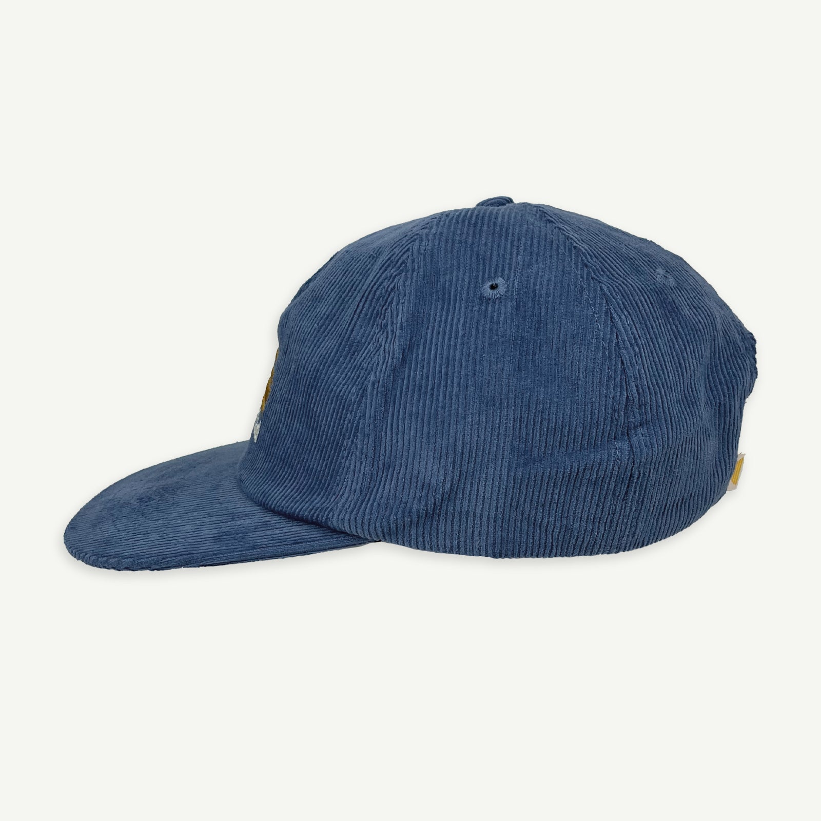Side view of blue corduroy Rad Dad cap.
