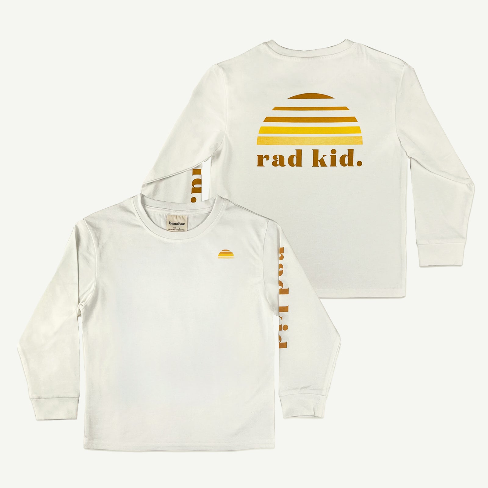 Two white long sleeve tees, one displayed frontally with the text 'rad kid' and a sun graphic on the chest, and another showing the back with a general view of the design.