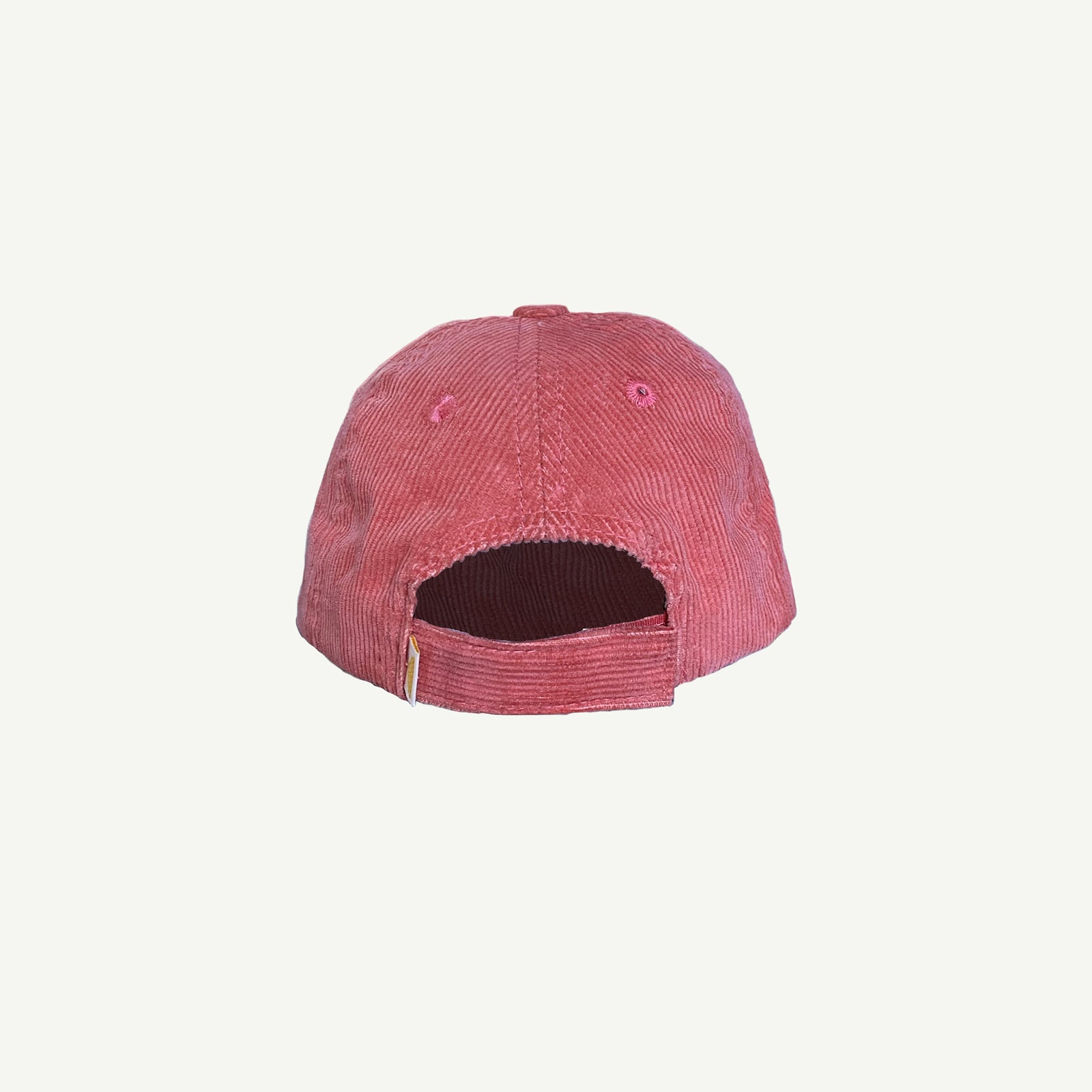 Back view of Magic Mini Cord Cap. Cap is Pink with velcro adjuster at center back.