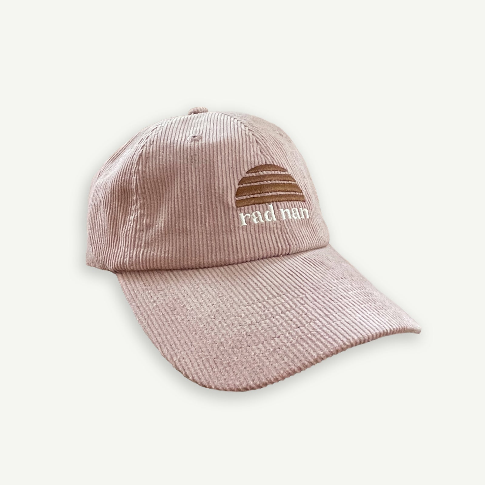 Rad Nan Corduroy pink cap with embroidered Banabae sun logo in brown and rad nan embroidered underneath