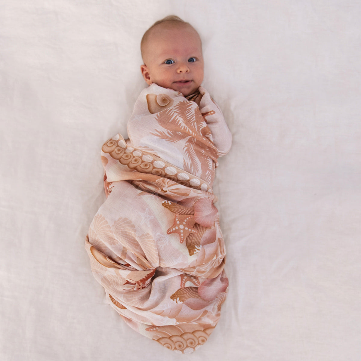 Shell Collector Swaddle and Peach Onesie Baby Bundle