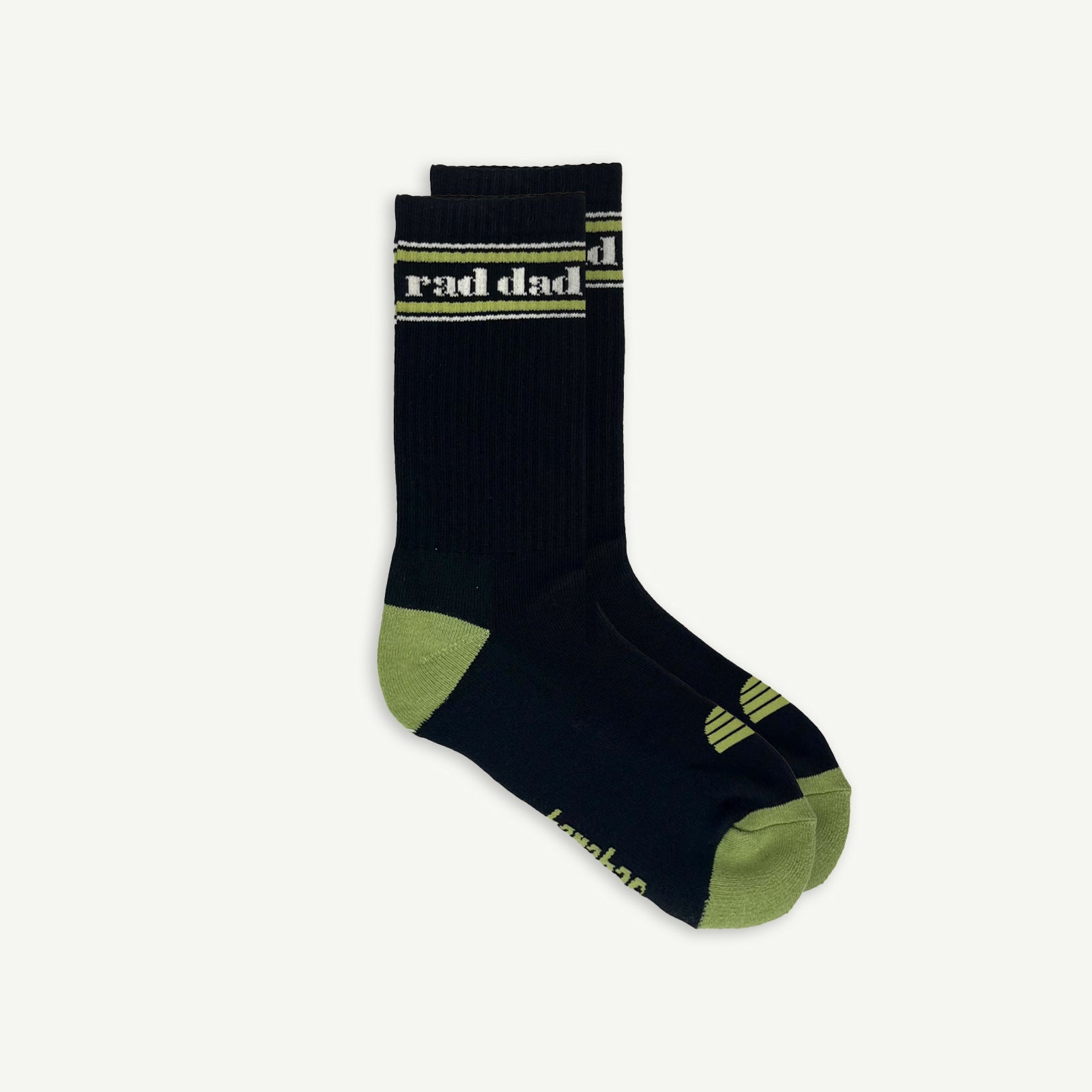 Black sock with green accents and 'rad dad' text on a white background