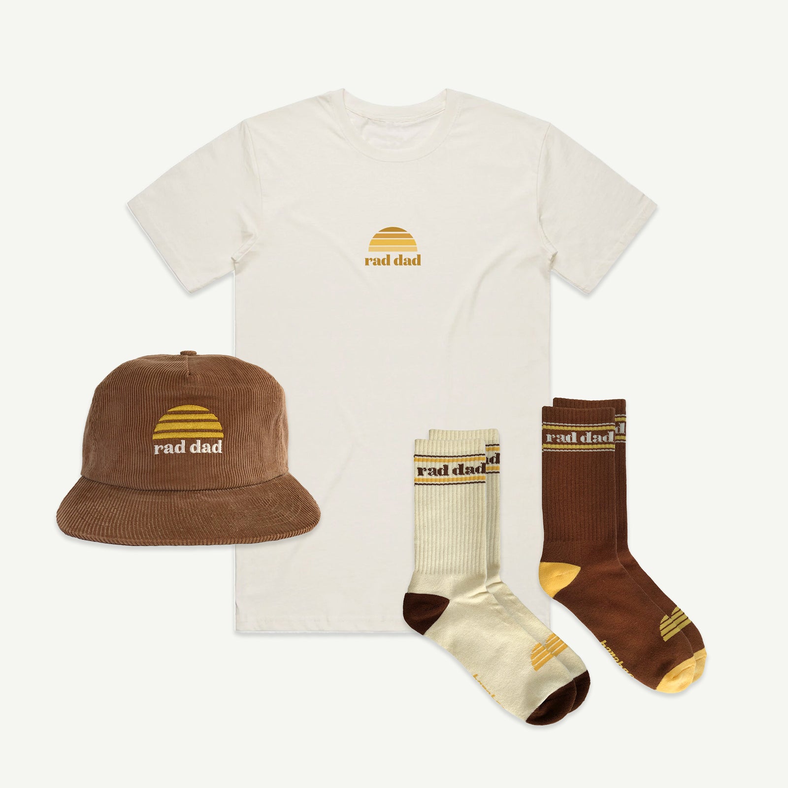 Collection of 'rad dad' branded white  t-shirt, tan cap, and  tan and white socks on a white background