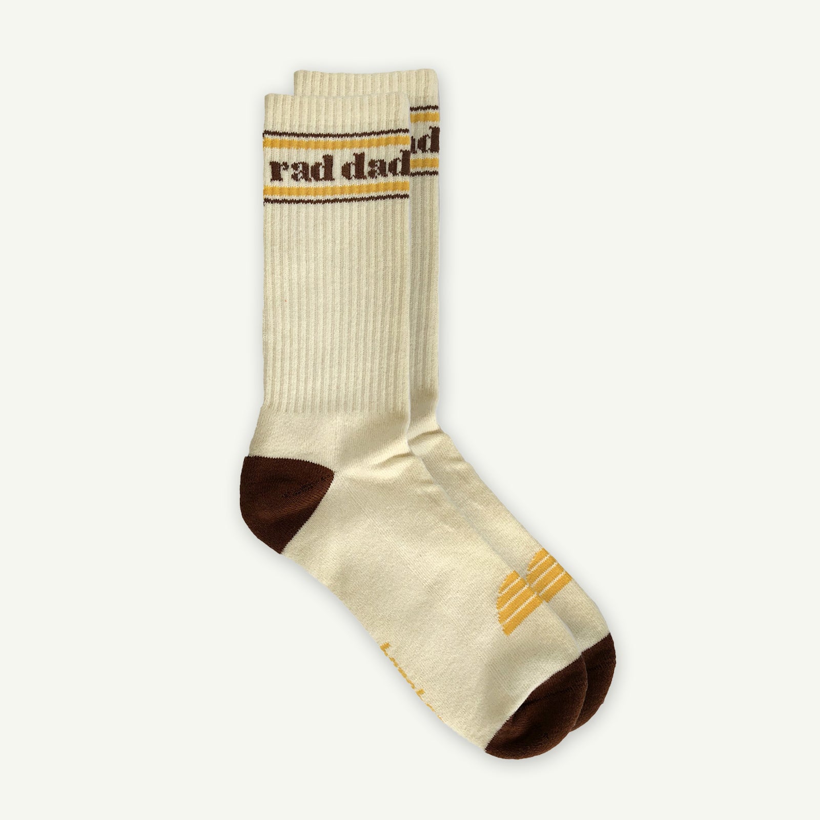 Beige sock with brown accents and 'rad dad' text on a white background