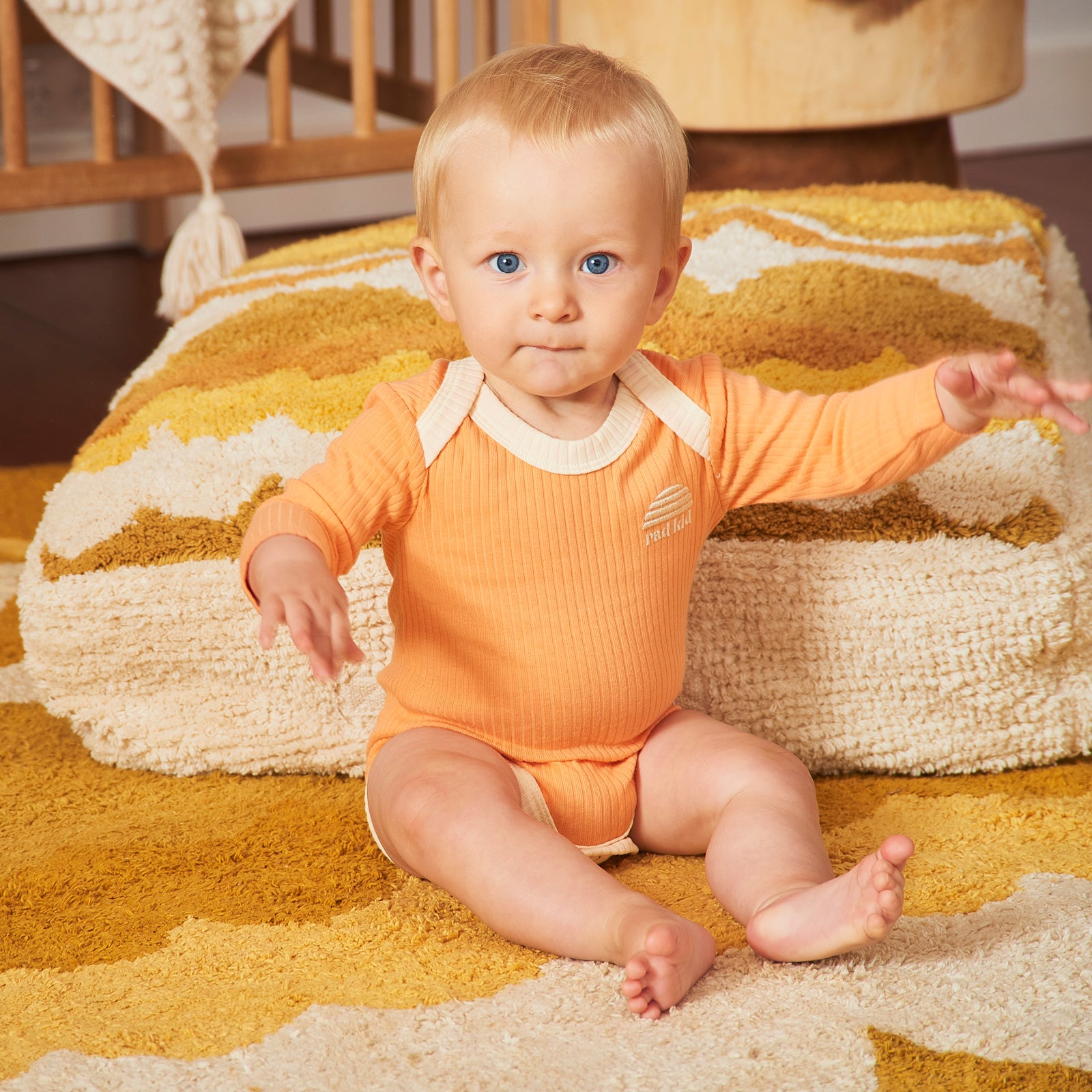 Peach Ribbed Organic Cotton Long Sleeve Onesie